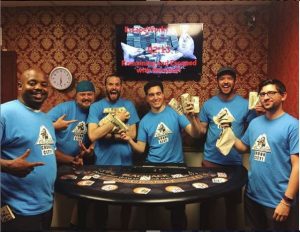 a group of men who completed the casino heist escape room